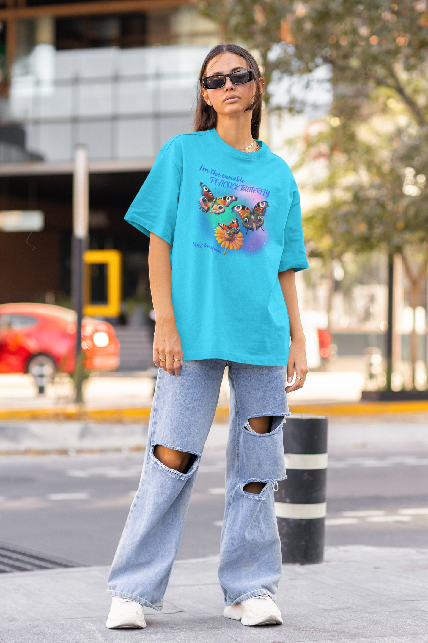 Shez Transforms Peacock Butterfly Sky Blue Oversized women Tshirts & Women Tops, Size : S , M, L, XL, 2XL, 3XL, 4XL, 5XL. Model  Smiling Pose