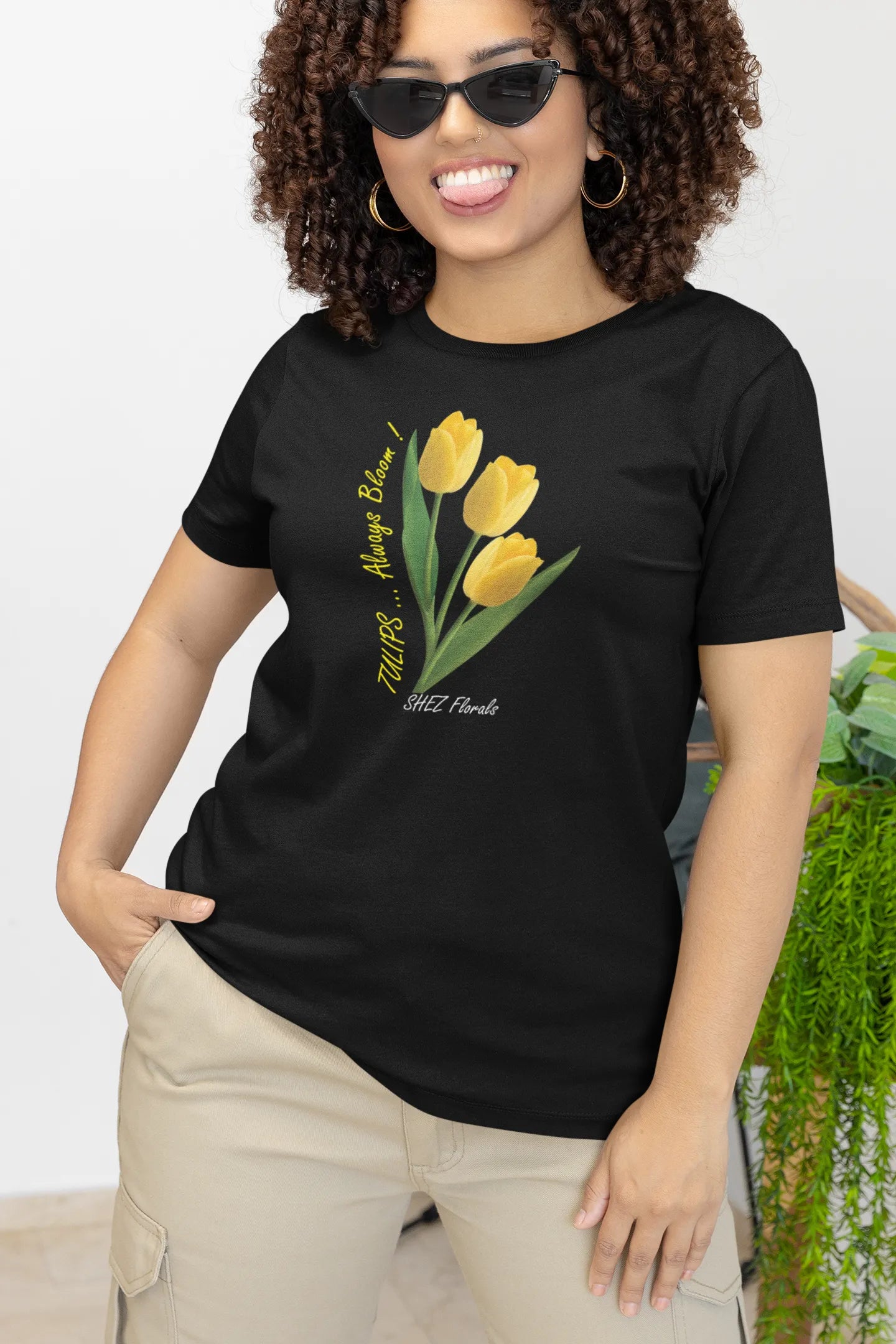 Shez Florals Black T Shirt for Women, Yellow Tulips, smiling woman pic