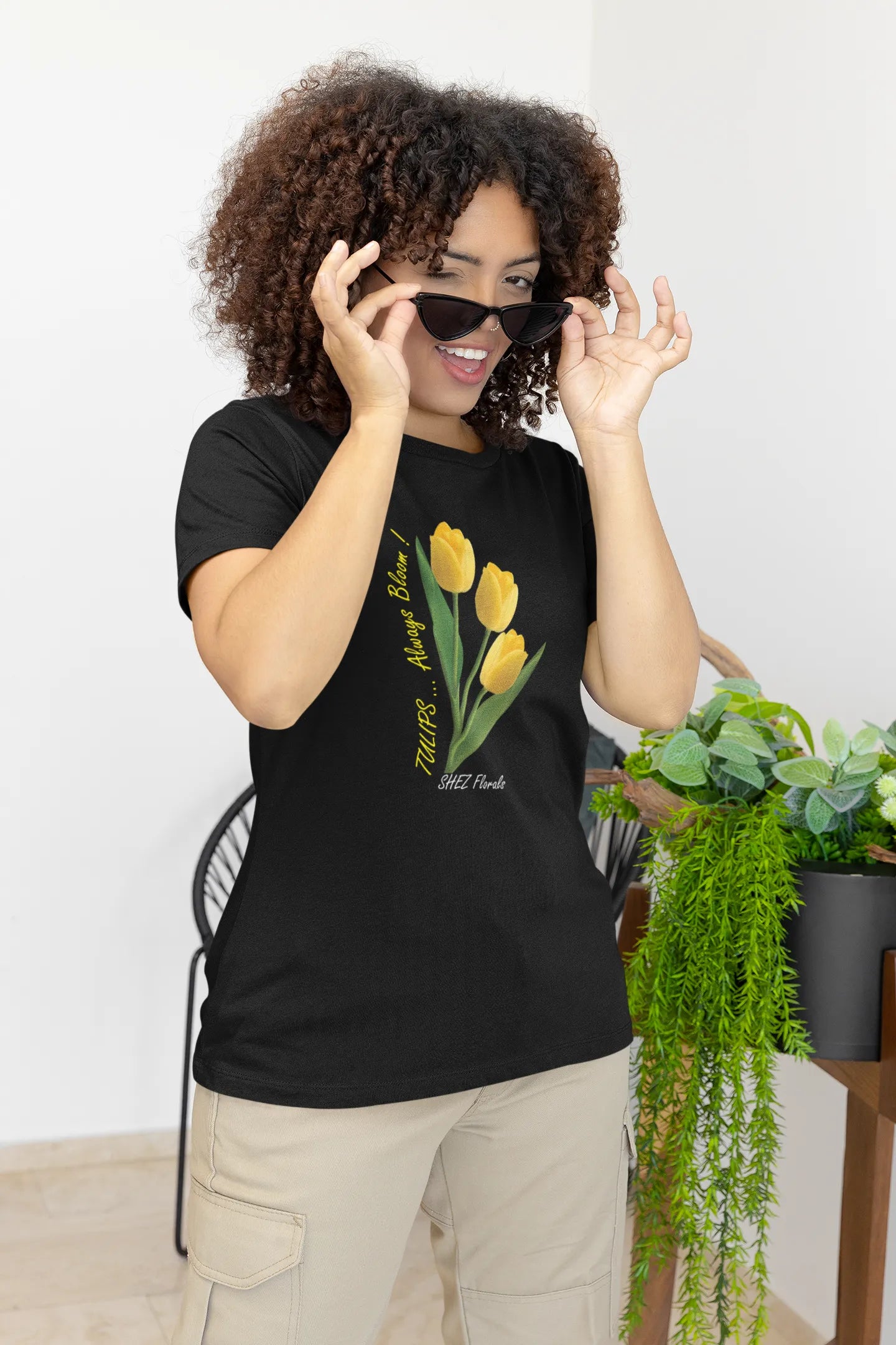 Shez Florals Black T Shirt for Women, Yellow Tulips, woman in goggles pic